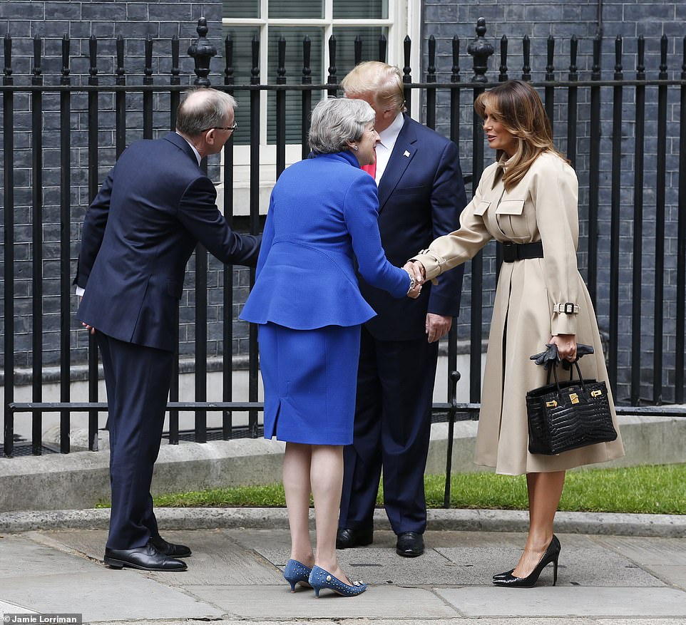 14347632-7102217-US_President_Donald_Trump_and_his_wife_Melania_at_Downing_Street-a-2_1559643880274