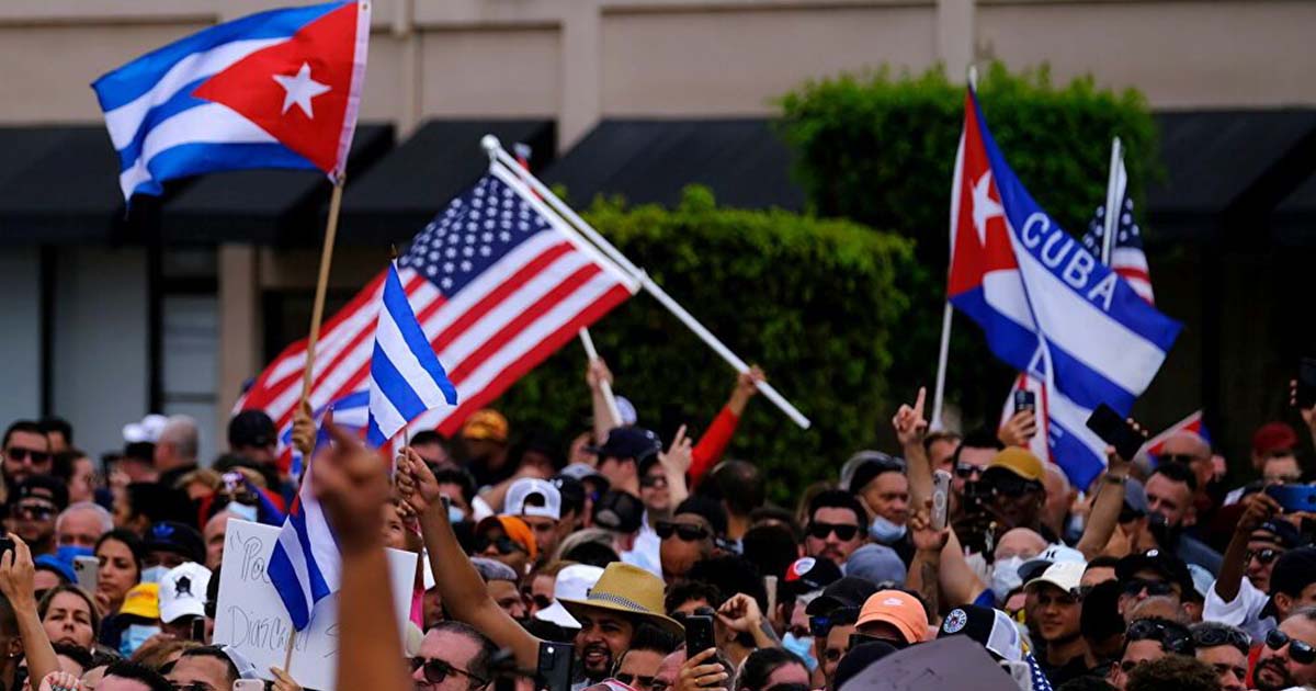 WATCH Cubans Carry American Flag While Demanding Freedom From