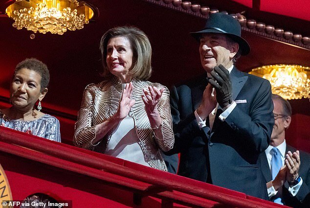65237393-11500953-Pelosi_joined_House_Speaker_Nancy_Pelosi_in_a_box_seat_to_view_t-a-53_1670205327486